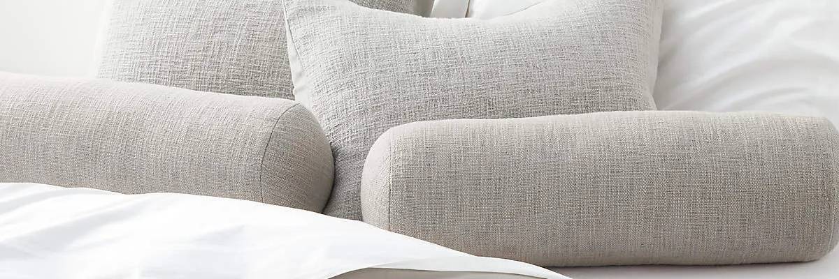 linen bolster pillows in interior