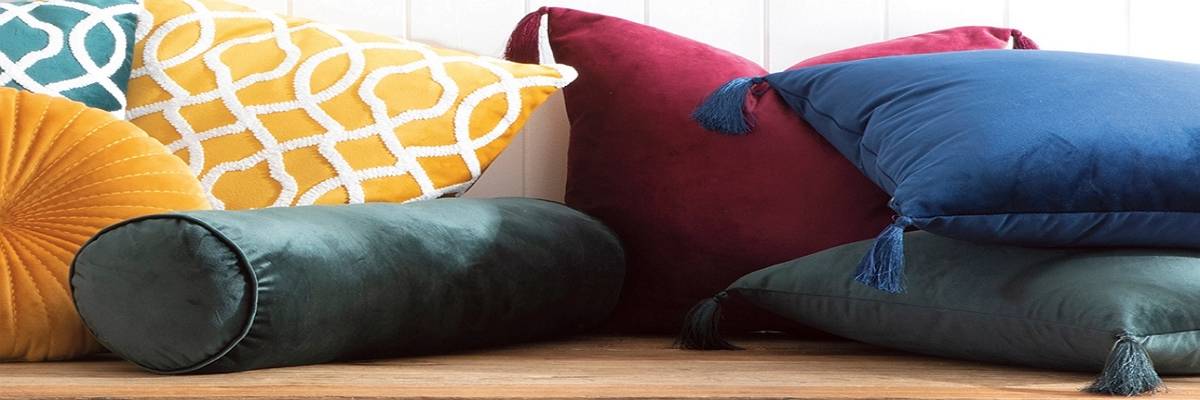 colourful bolster and square pillows