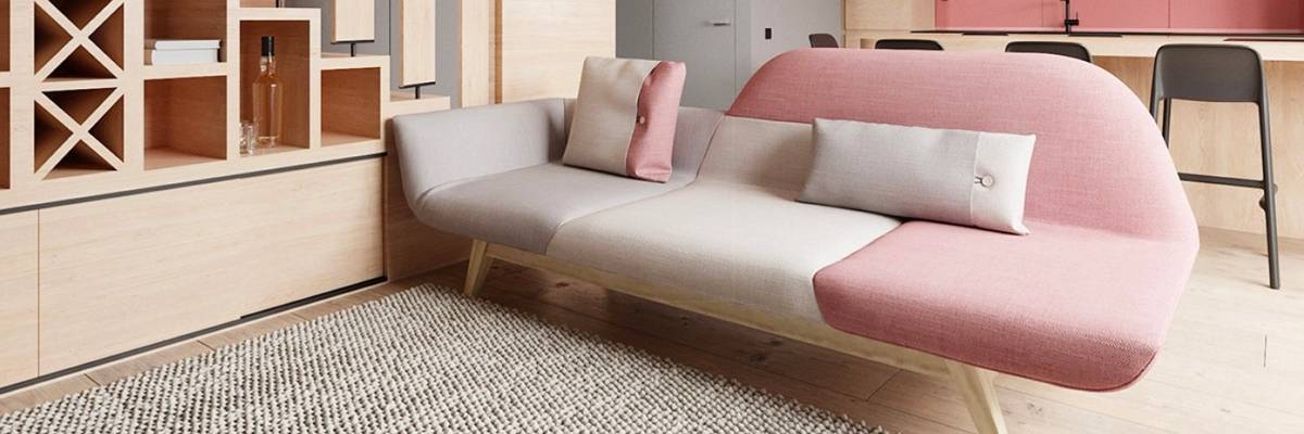 blush bolster pillows in a modern interior