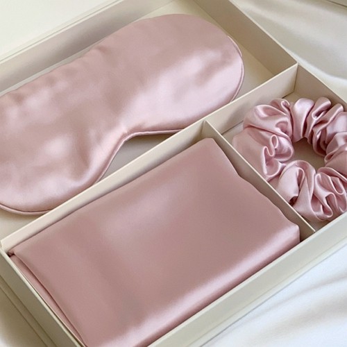 a set of pillow cover, sleeping mask and a satin hair pin